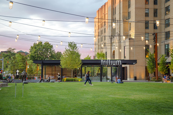The exterior of the Trillium Fenway taproom at sunset